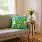 Large sustainable embroidered cushion with green and blue geometric design on linen, reversible wool back, 65x65cm floor cushion.