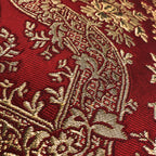 Luxurious jacquard woven cushion cover in red with gold paisley and gold twisted piping, 45x45cm.