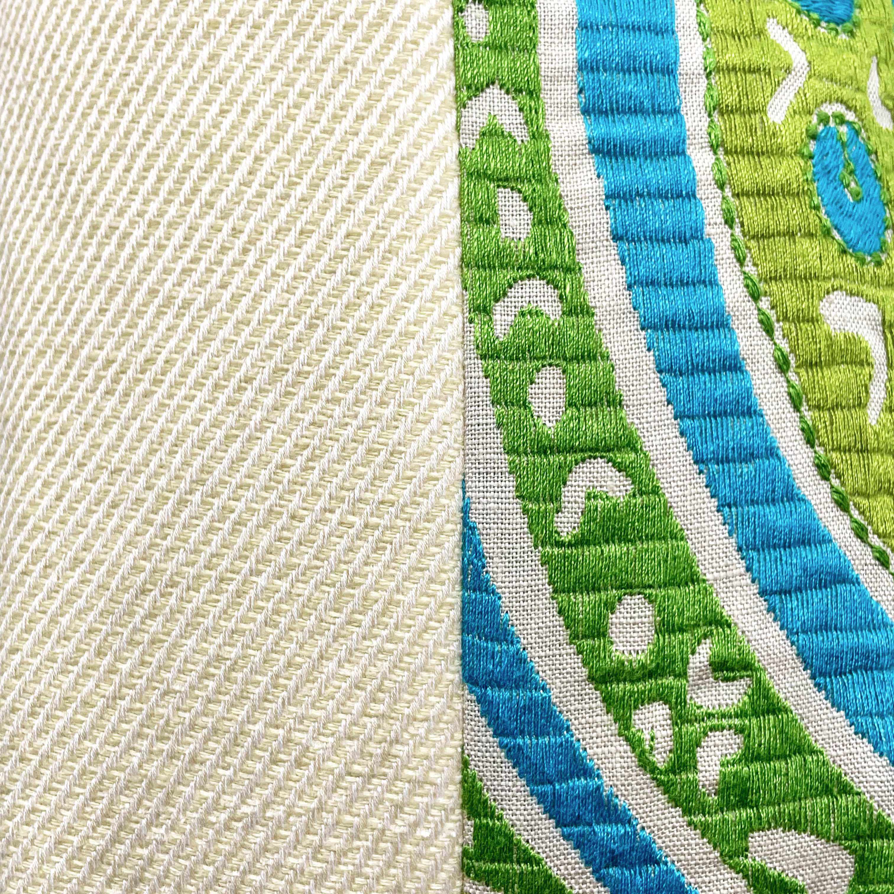 Large sustainable embroidered cushion with green and blue geometric design on linen, reversible wool back, 65x65cm floor cushion.