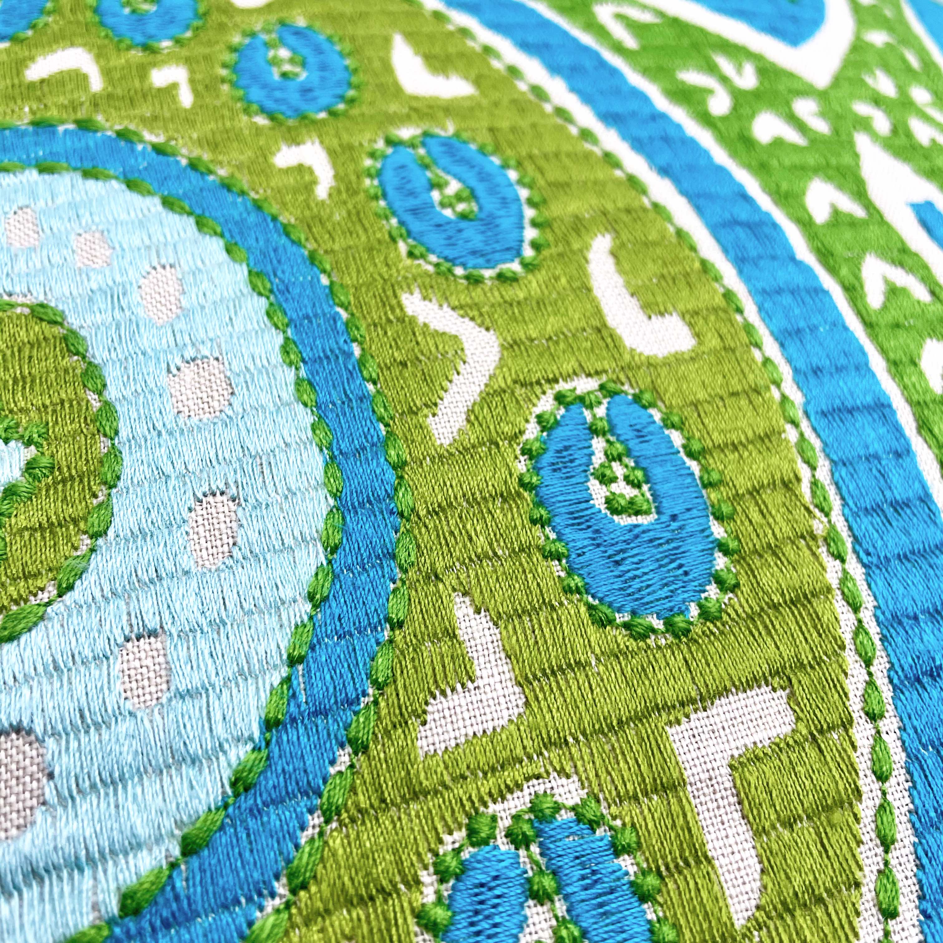 Large sustainable embroidered cushion with green and blue geometric design on linen, reversible wool back, 65x65cm floor cushion.